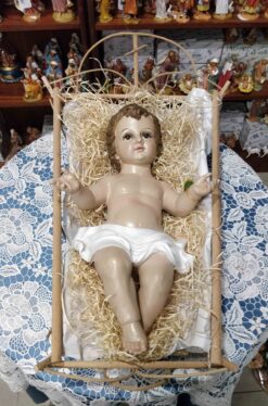 PB16833 - BABY JESUS W MANGER 27CM
