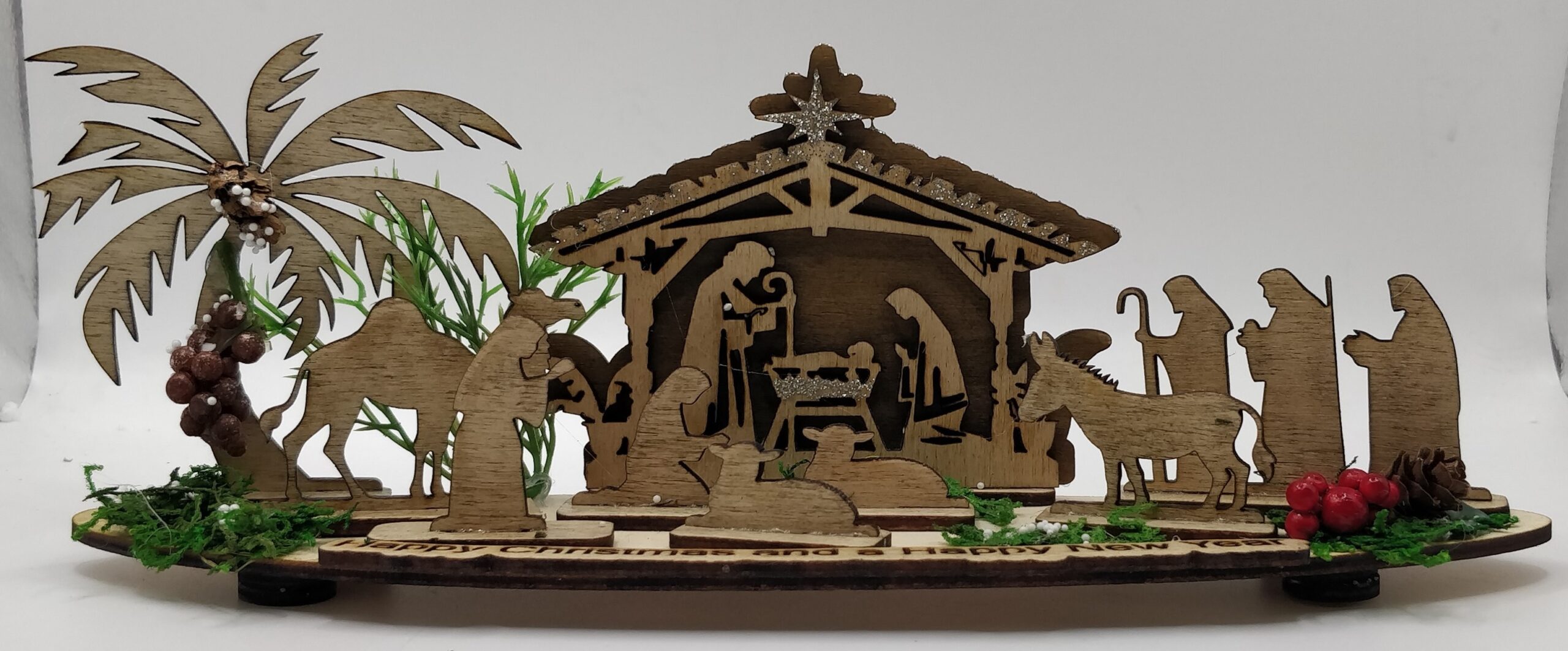 SMALL WODD NATIVITY LASER CRIBS WO LIGHT